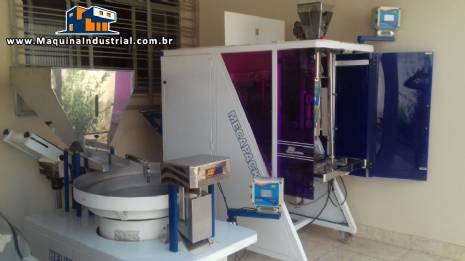 Empacotadora e pesadora JHM Empacotadora e pesadora JHM